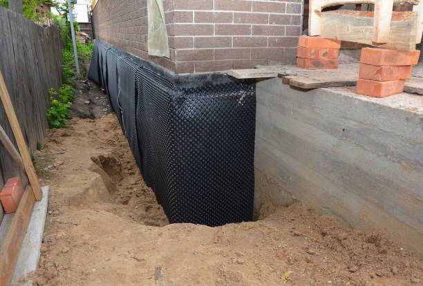 SJ Waterproofing Pros technician performing targeted Sump Pump Installation assessment in New Washington, OH